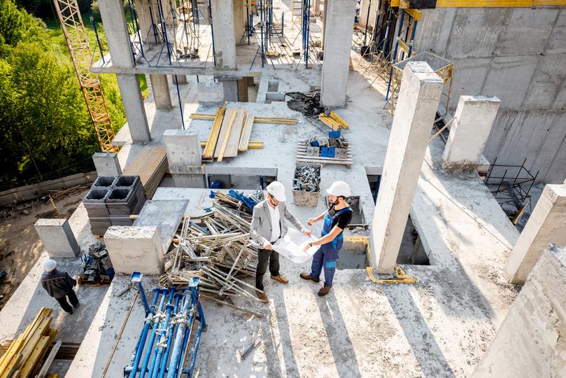 Construction workers building a new house