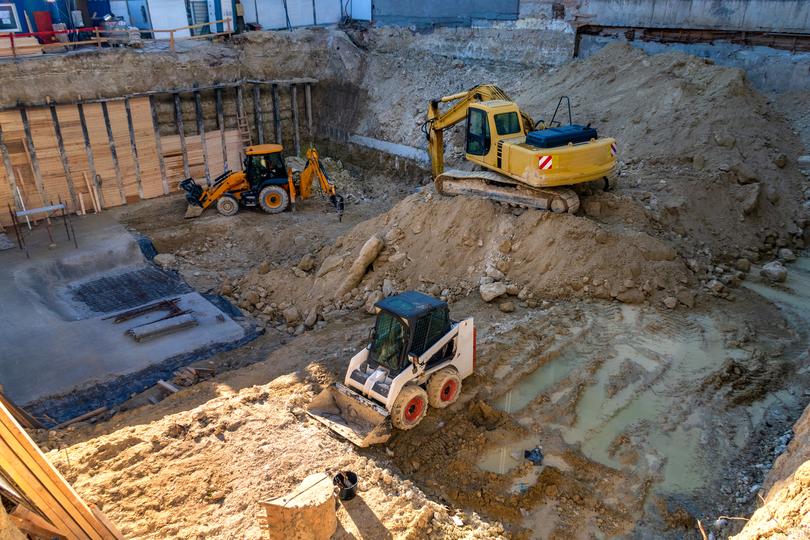 Construction workers building a new house